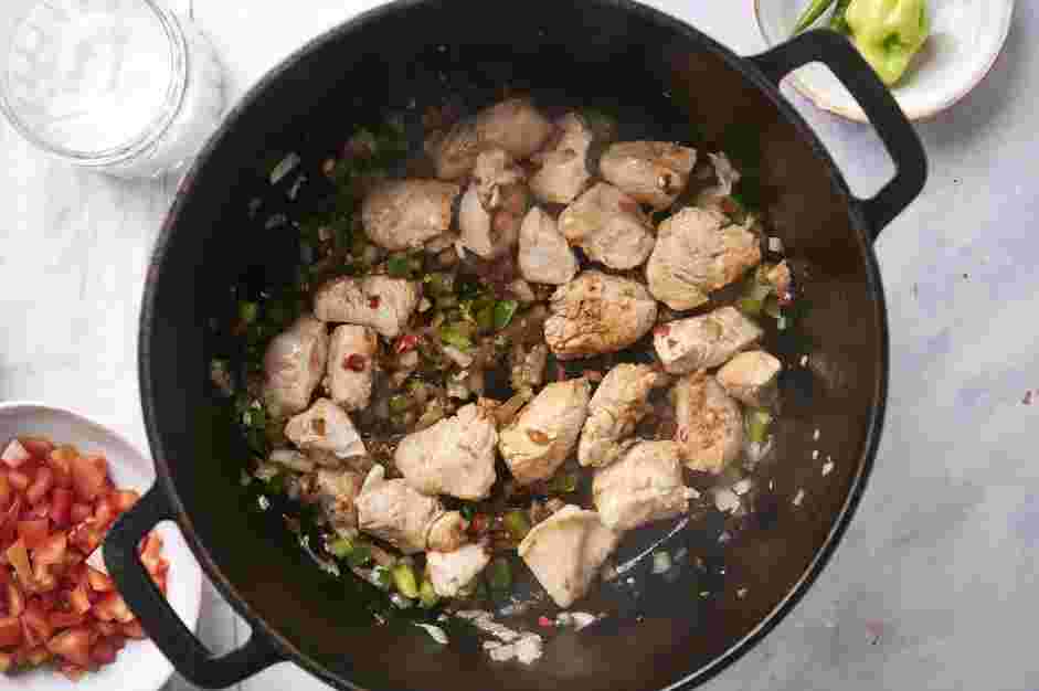 Green Chili Stew Recipe: Stir in curry powder and cayenne pepper.