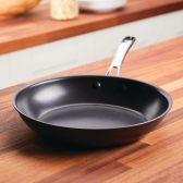 Ayesha Curry Hard Anodized Collection Nonstick Deep Frying Pan with Lid and Helper Handle, 12.25-Inch, Charcoal