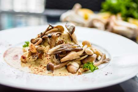 mark duck confit risotto with mushrooms