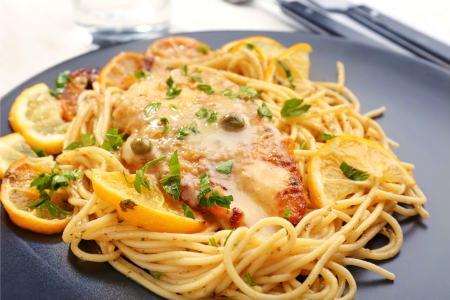 Chicken Piccata With White Wine Caper Beurre Blanc Over Angel Hair Pasta