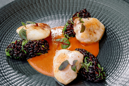 Seared Scallops and Black Rice in sauce