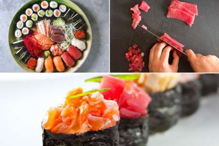 a variety of sushi rolls, gunkan and a chef slicing tuna