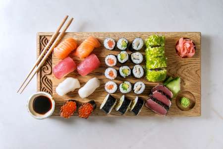 assortment of nigiri and sushi rolls