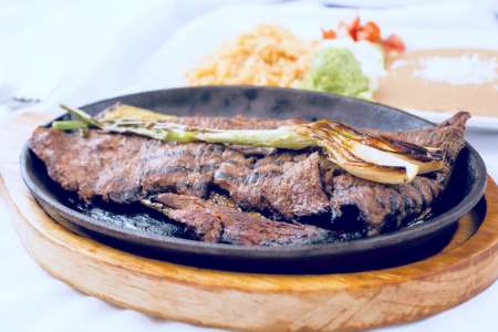 carne asada with onion and bell peppers