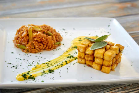 cashew crusted tofu with thai curry risotto