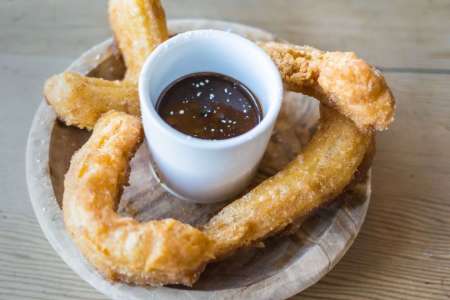 churros and chocolate on a food tour in barcelona