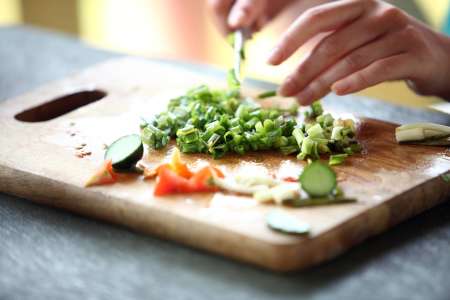 Kids chopping vegetables