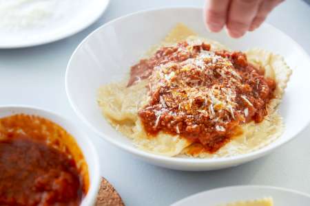 homemade ravioli with marinara and cheese