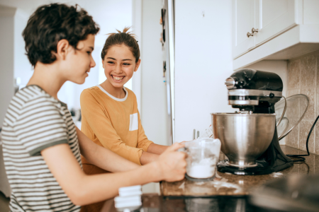 kids cooking french food in a cooking class