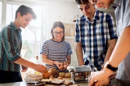 kids taking a pasta making class