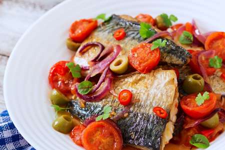 mediterranean white fish with tomatoes, capers and olives