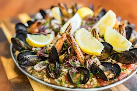 paella with seafood mussels and cilantro