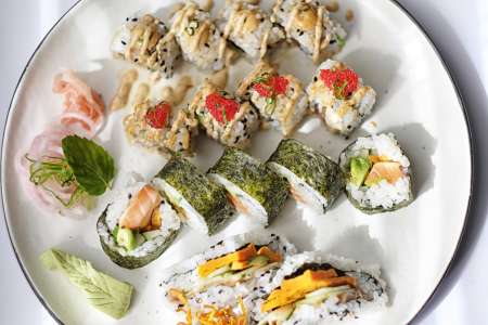 plate of various sushi rolls