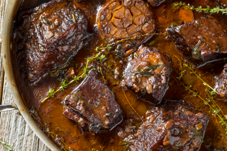 Braised short ribs in a pan