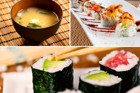 bowl of miso soup, plate of tempura shrimp sushi rolls and assortment of maki sushi rolls