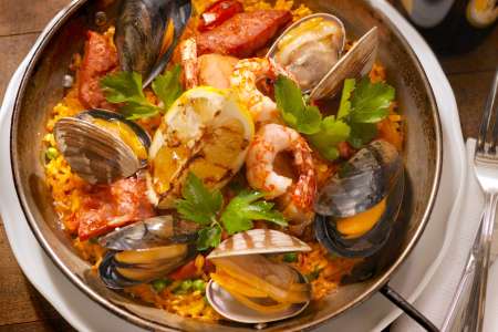 saffron paella with chicken and seafood