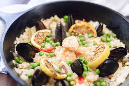 seafood paella with mussels prawns and calamri