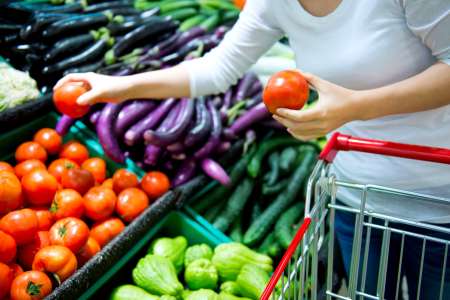 shopping for tomatoes at the store