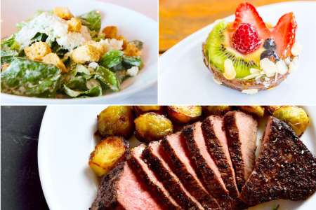 steak with a caesar salad and a fruit tart