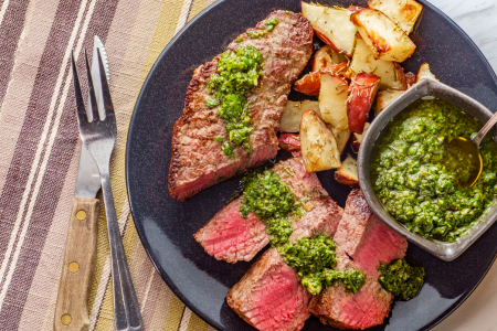 steak with chimichurri and potatoes