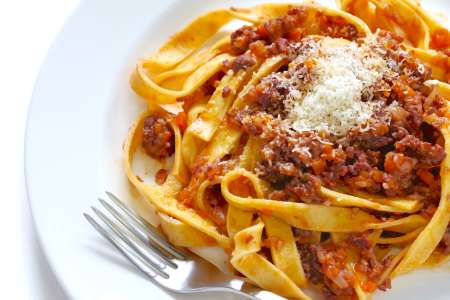 tagliatelle pasta with meat and mushroom sauce