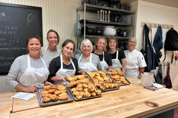  Friends celebrating a birthday with a cooking class in NYC