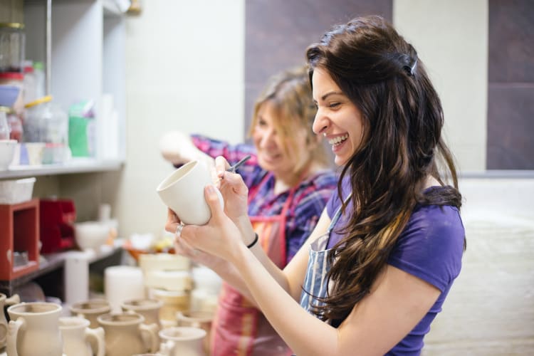 Work groups making pottery together in NYC