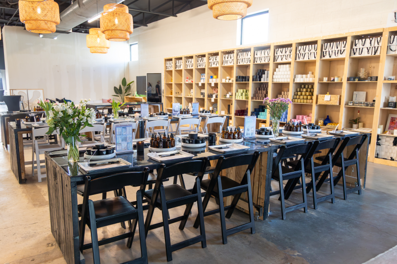 Dallas - Candle making studio setup with tables, supplies and classroom seating Shot
