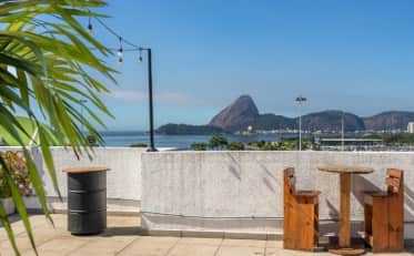 B&B HOTEL rooftop terrace with scenic ocean view and Sugarloaf Mountain in the background