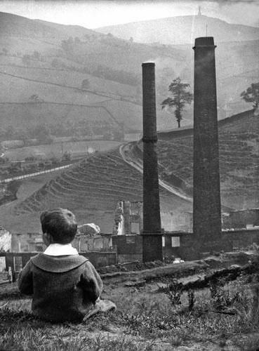 Sam Gibbon looking at the aftermath of the Jumble Hole Mill fire