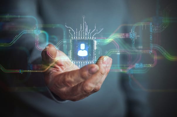 Hand holding conceptual chip with user data