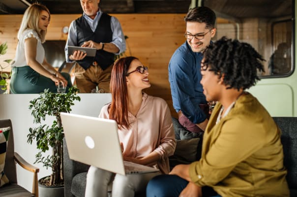 Team of happy business people working on a collaborative project