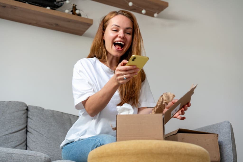 Girl taking photo of new package received 