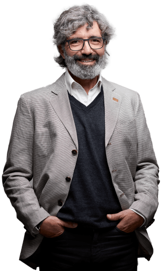 Smiling man in sports coat with hands in pockets
