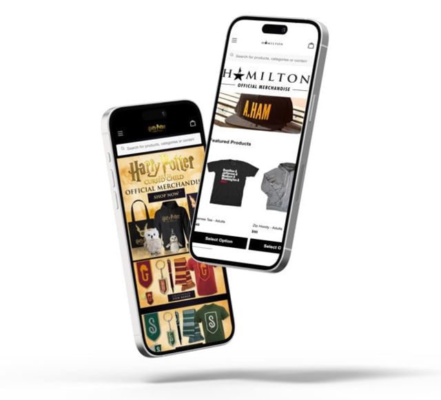 Two mobile phones, one phone showing the Hamilton musical web store and the other phone showing the Cursed Child musical web store.