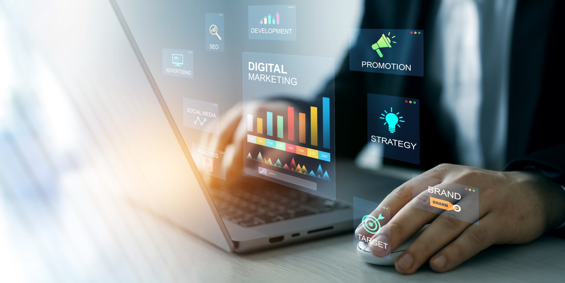 Digital Marketing graphics floating over laptop