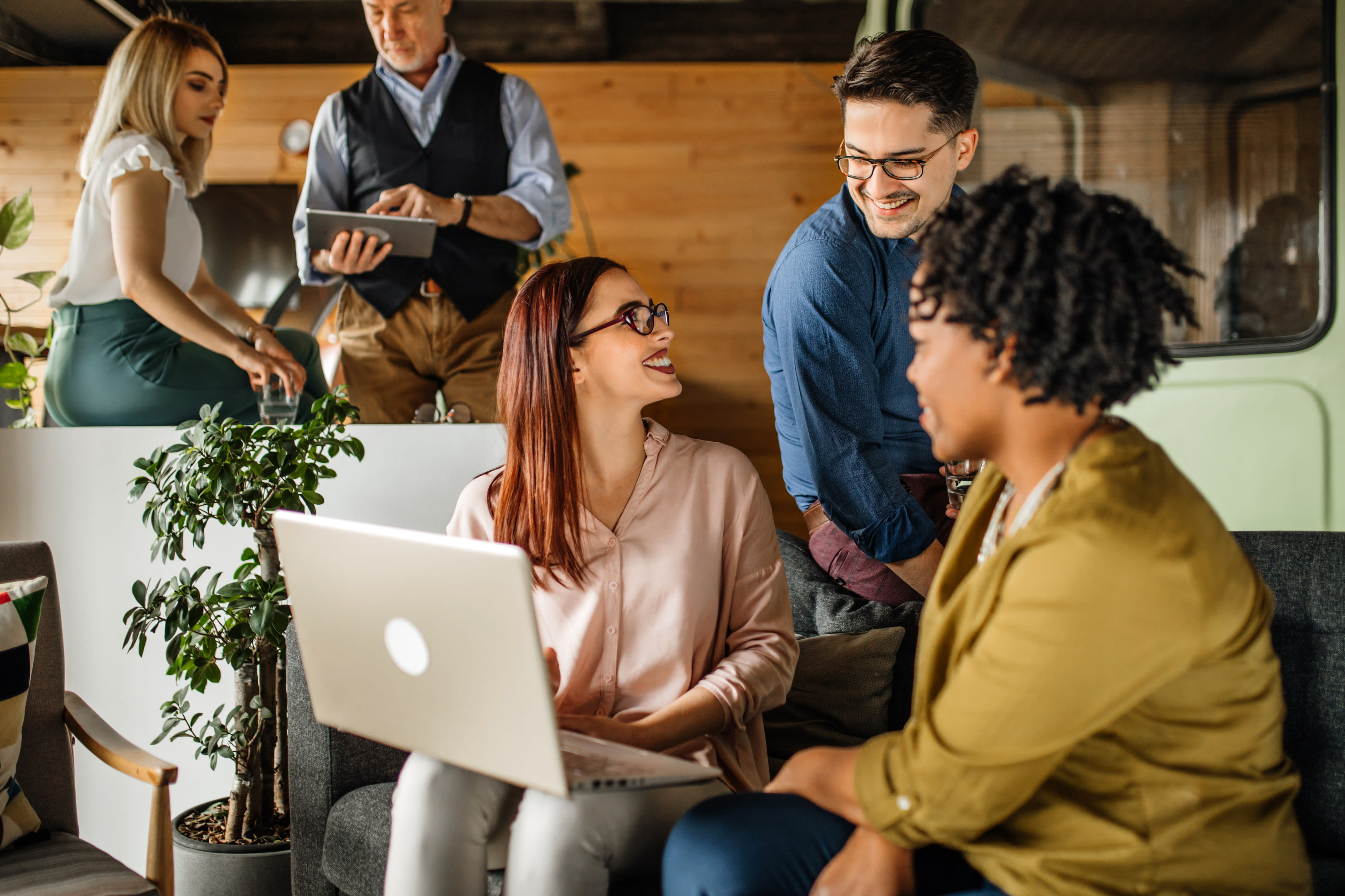 Team of happy business people working on a collaborative project