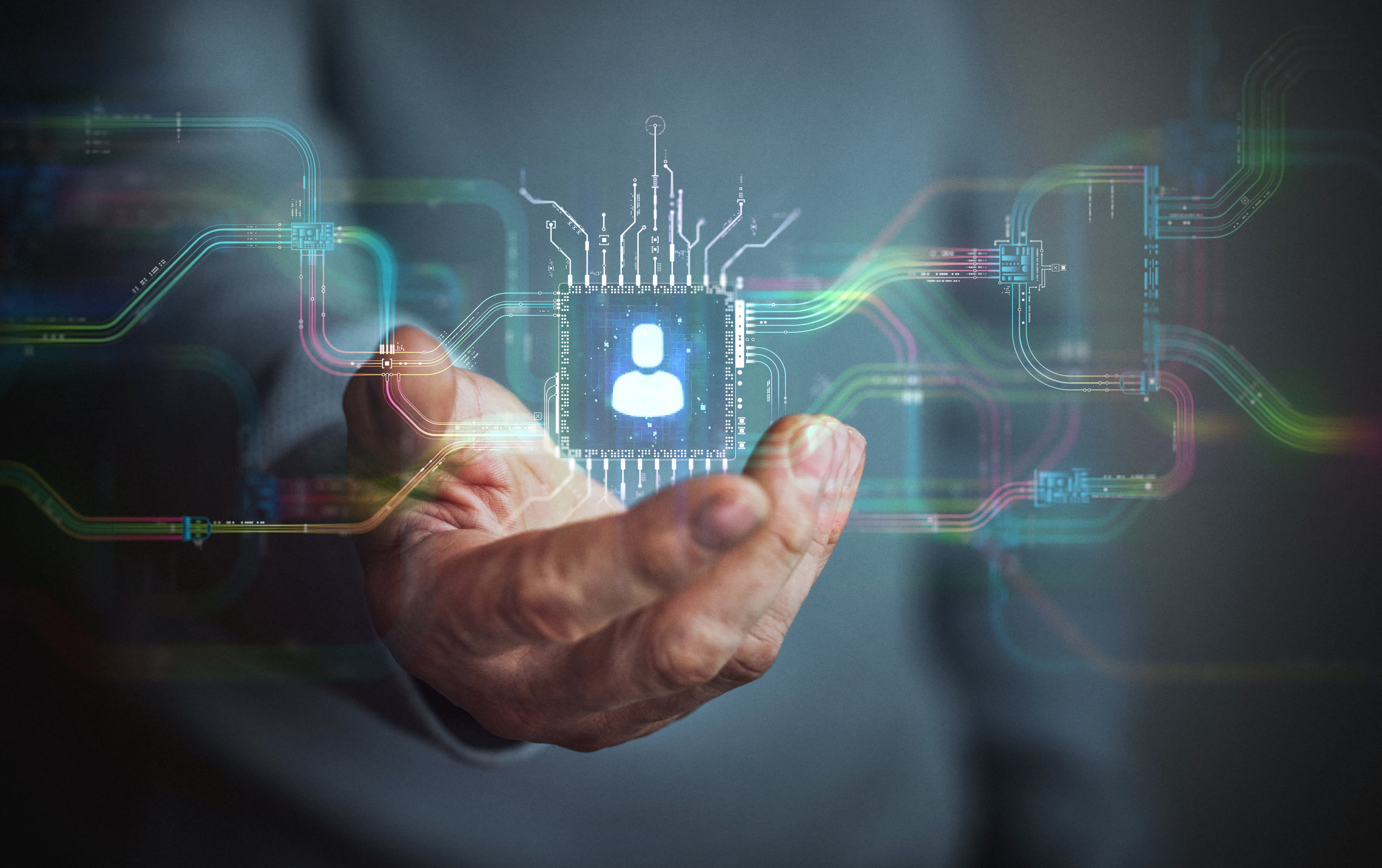 Hand holding conceptual chip with user data