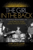 Book cover of The Girl in the Back: A Female Drummer's Life with Bowie, Blondie, and the '70s Rock Scene