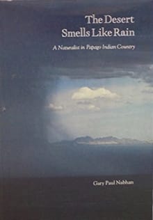 Book cover of The Desert Smells Like Rain: A Naturalist in Papago Indian Country