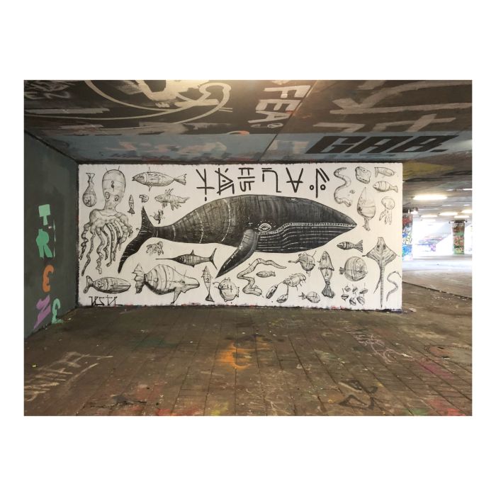 Black and white street art by Lesie