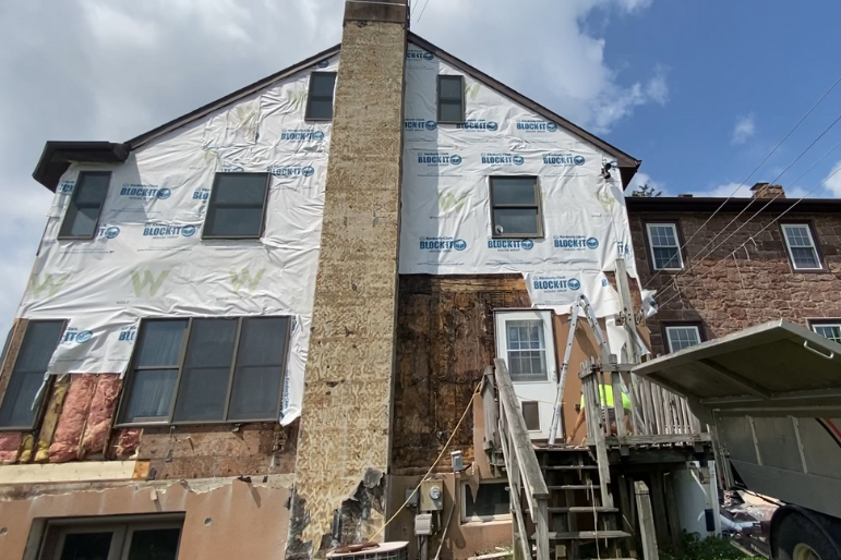 When is stucco removal necessary?