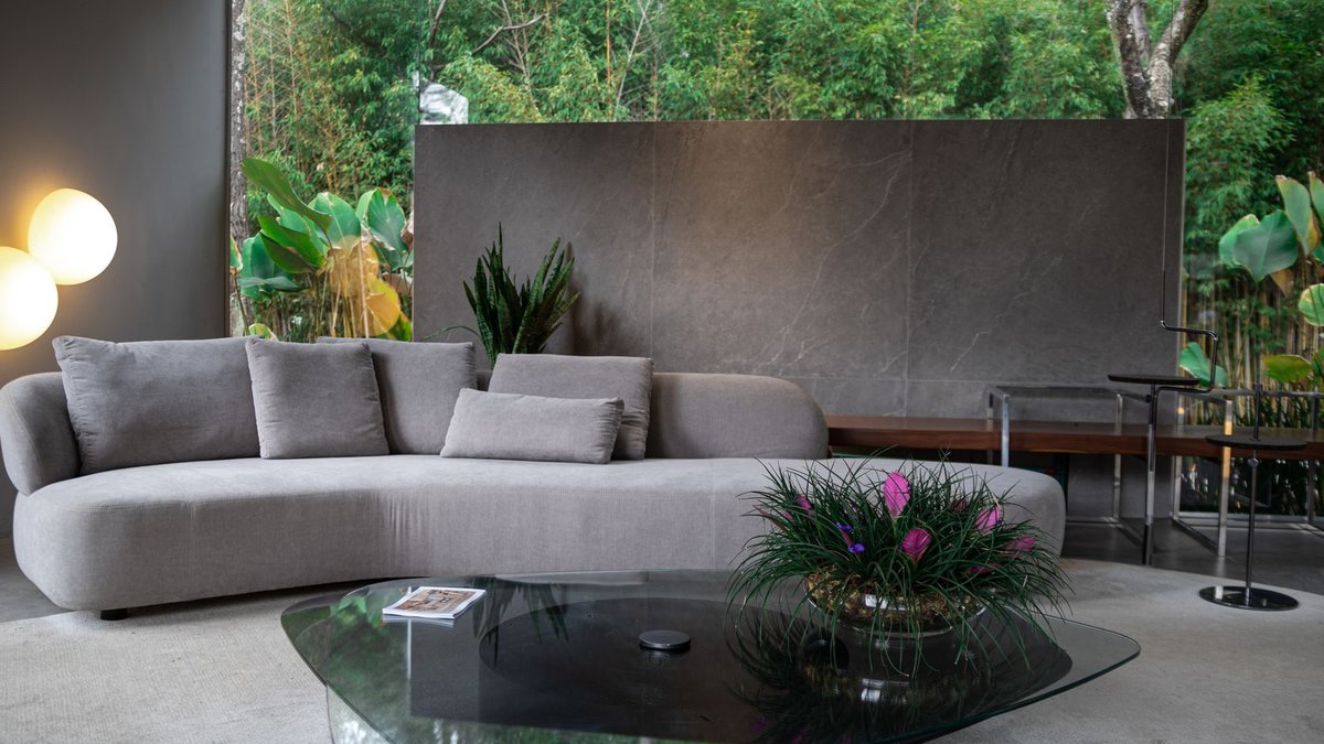Stylish living room featuring a sleek sofa and coffee table in Belo Horizonte, Brazil.