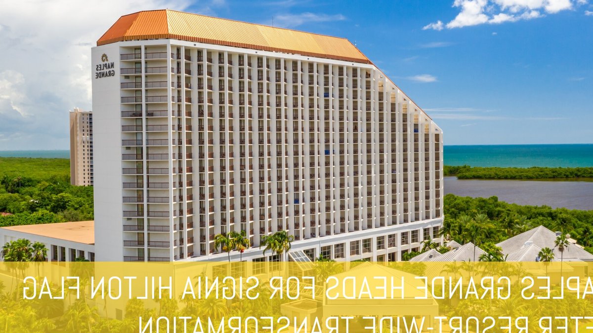 Naples Grande reopens under new Hilton brand Aerial view of Signia Hilton Naples Grande Beach Resort, a large white resort building with an orange roof surrounded by palm