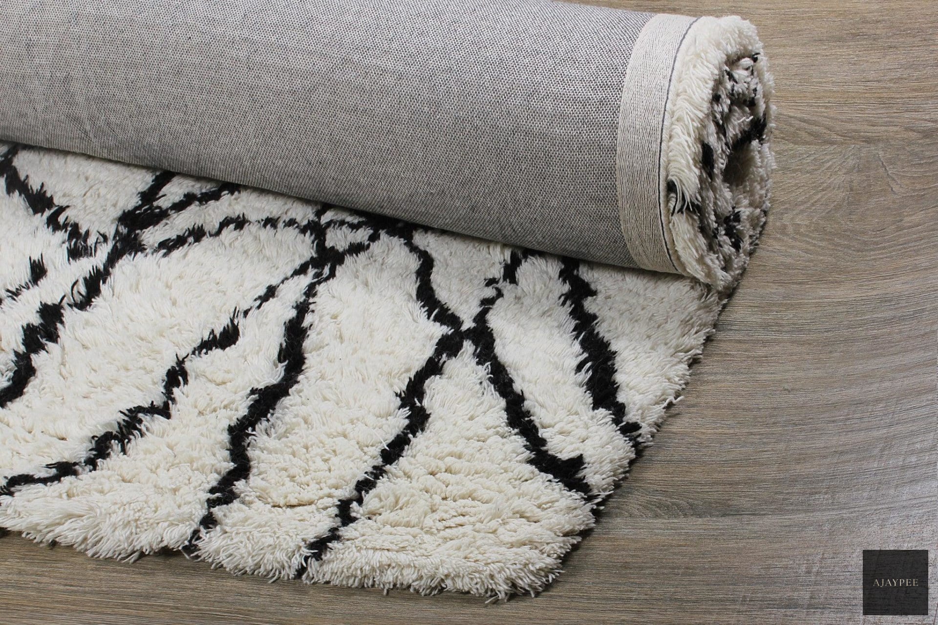 Wool HandTufted Carpet-Reverse Netz - Cotton - Hand Knotted - Ajaypee Carpets (Detail)