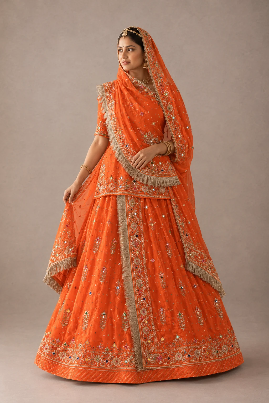 Kesariya Utsav Poshak Rajputi poshak – georgette material with Danka Handwork, Zardozi & Ancestral Gota Patti