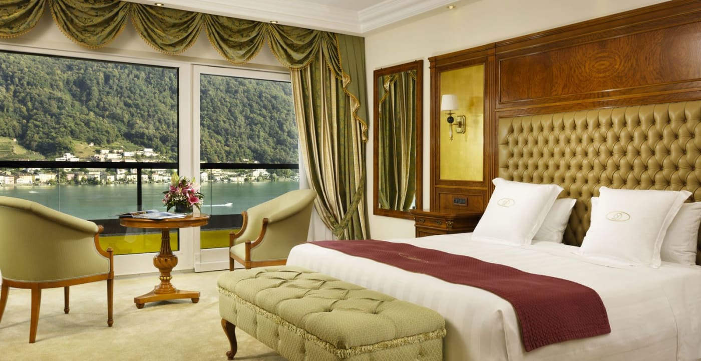 A renovated suite at the Swiss Diamond Hotel opening onto Lake Lugano