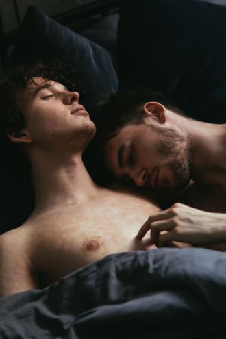 man touching his partner on the chest