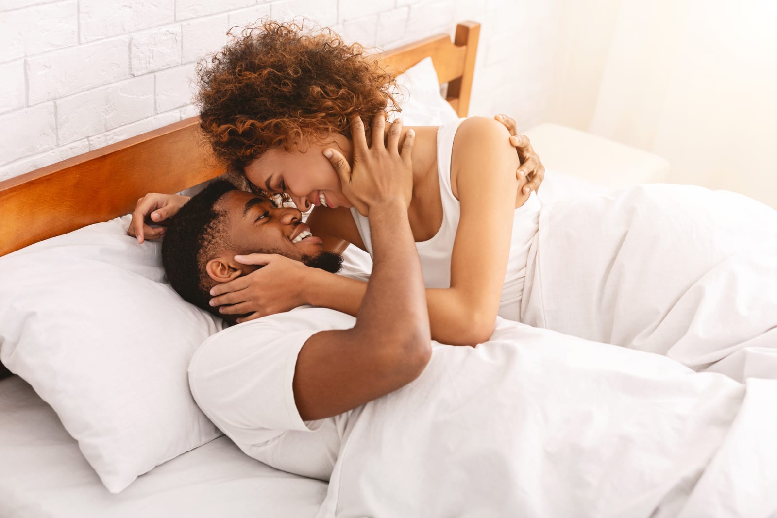 Image of a couple in bed