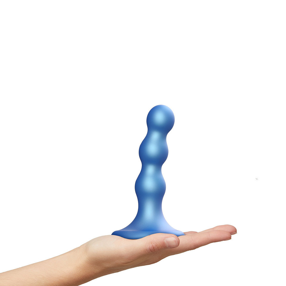 Strap-On-Me Dildo Plug Balls held in hand